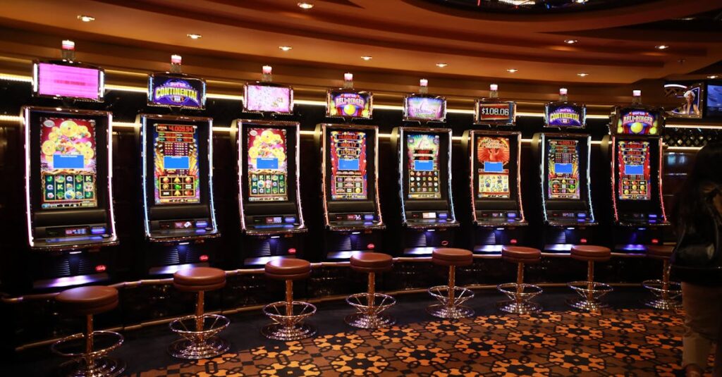 A row of luxury slot machines in a casino interior with plush stools, perfect for gaming enthusiasts.